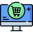 Online shopping icon with cart on a computer screen.